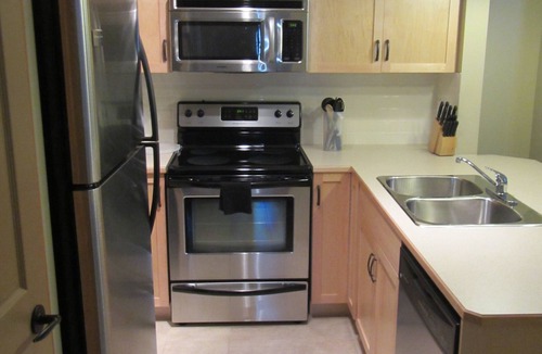 Canmore Condo | Mountain views, top floor, large deck, comfortable beds, AC