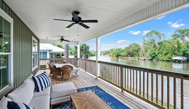 Bring the whole crew to Rest & Reel! This 4BR/2BA Fish River cottage sleeps 12 and offers great fishing, a private pier, boat watching, and a game table for family fun. Relax, reel one in, and make memories! in Fairhope