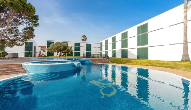 Holiday Home 'Cala´n Bosch 1a Planta' with Shared Pool, Shared Garden and Air Conditioning in Cap d'Artrutx